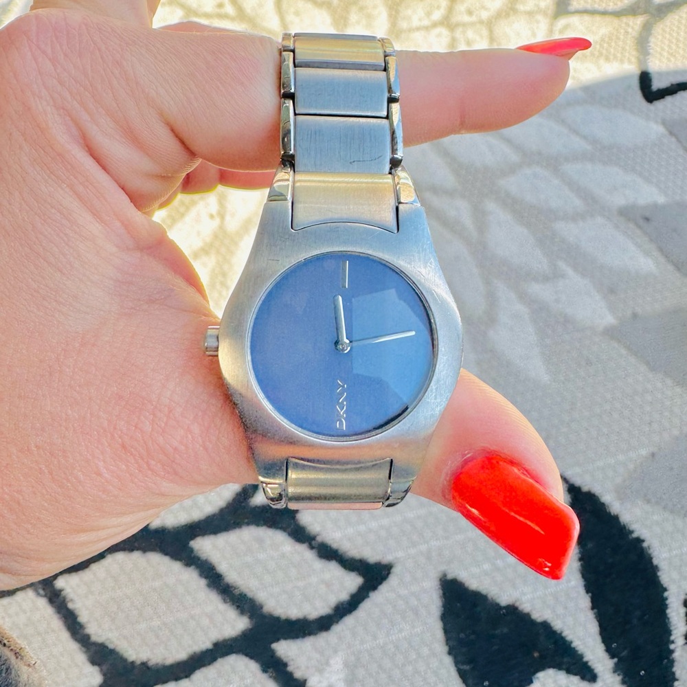 DKNY Silver and Blue Smartwatch with Minimalist Design